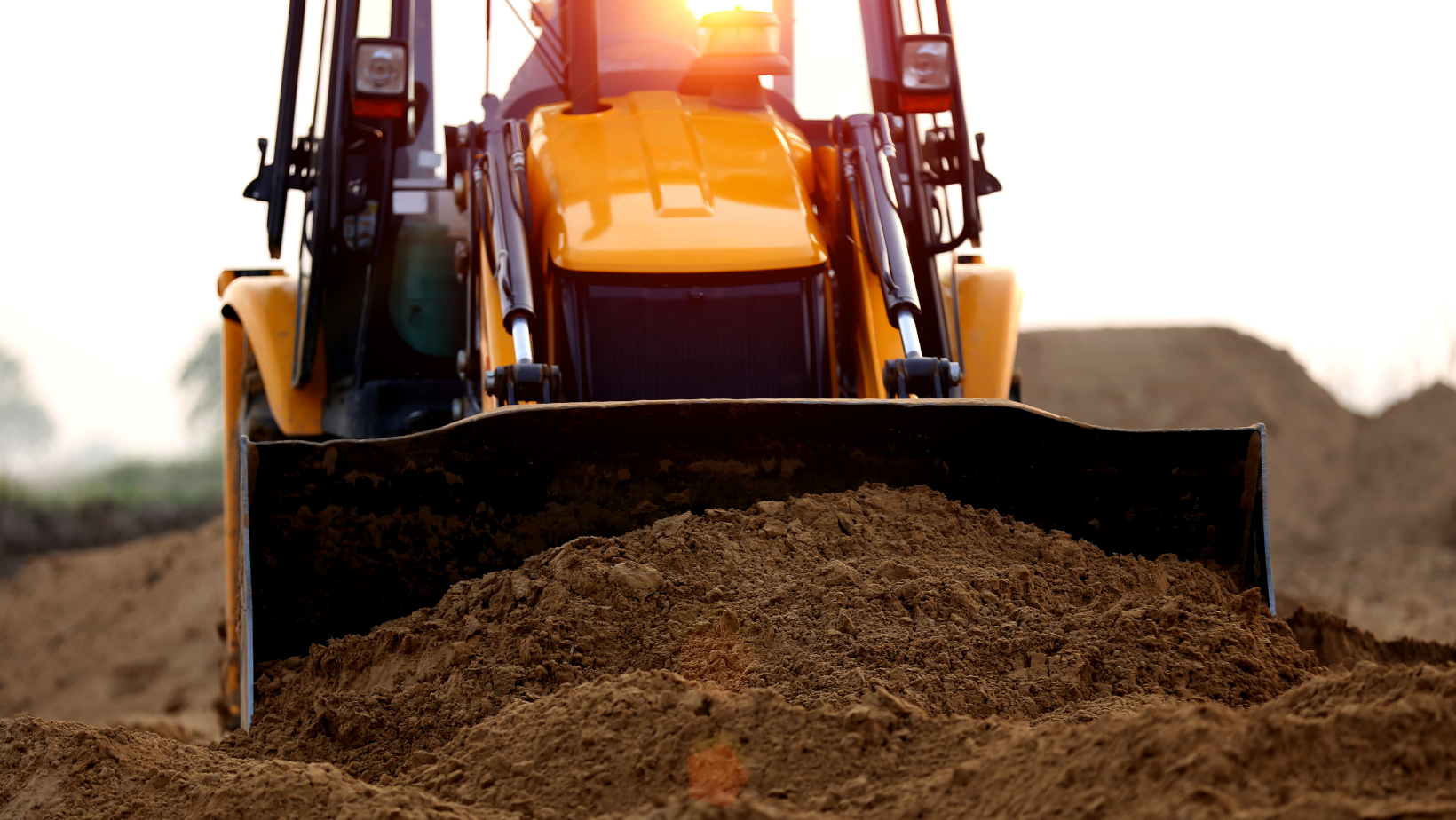 Loader pushing dirt on a jobsite